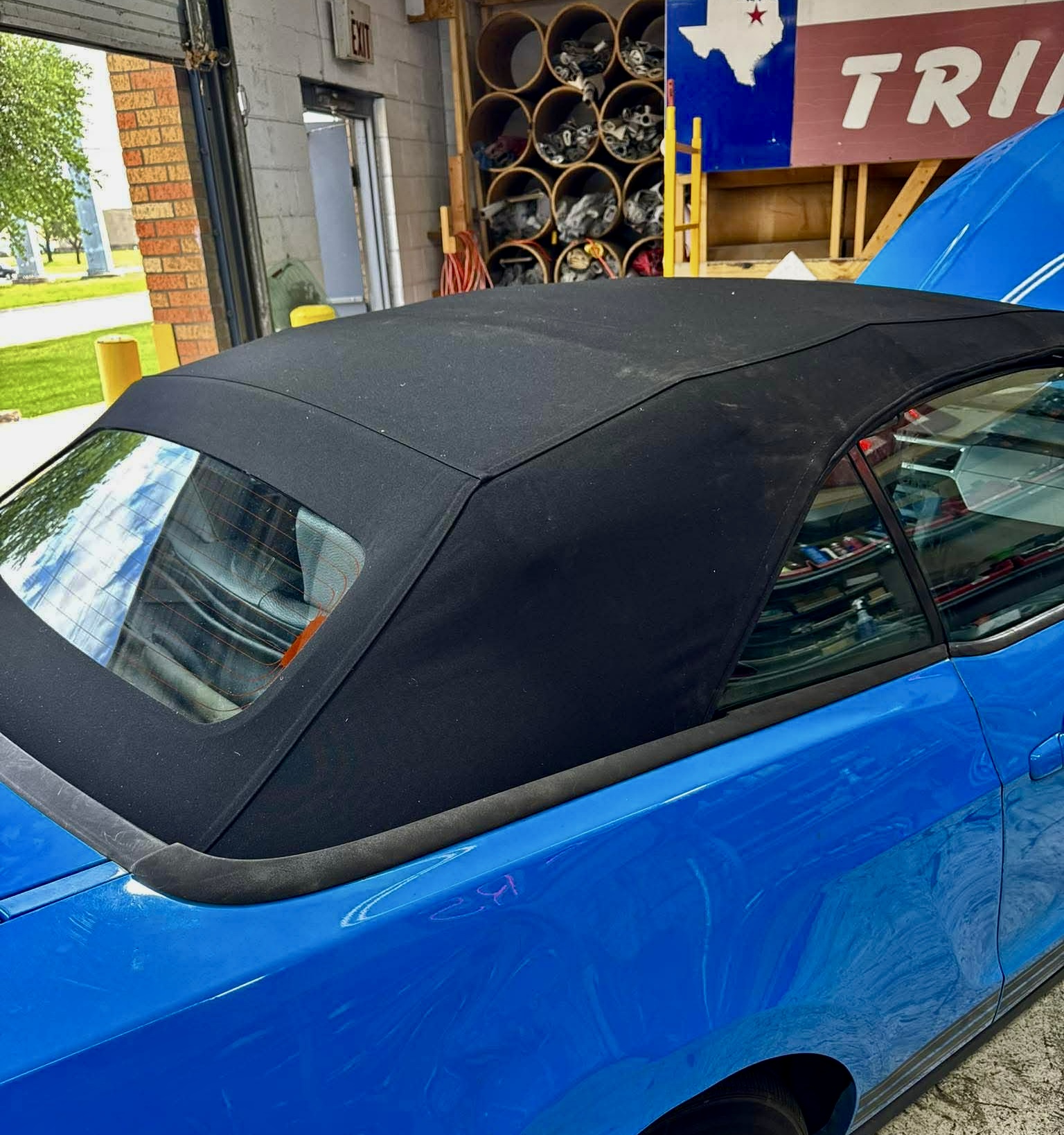 Blue convertible with custom soft top