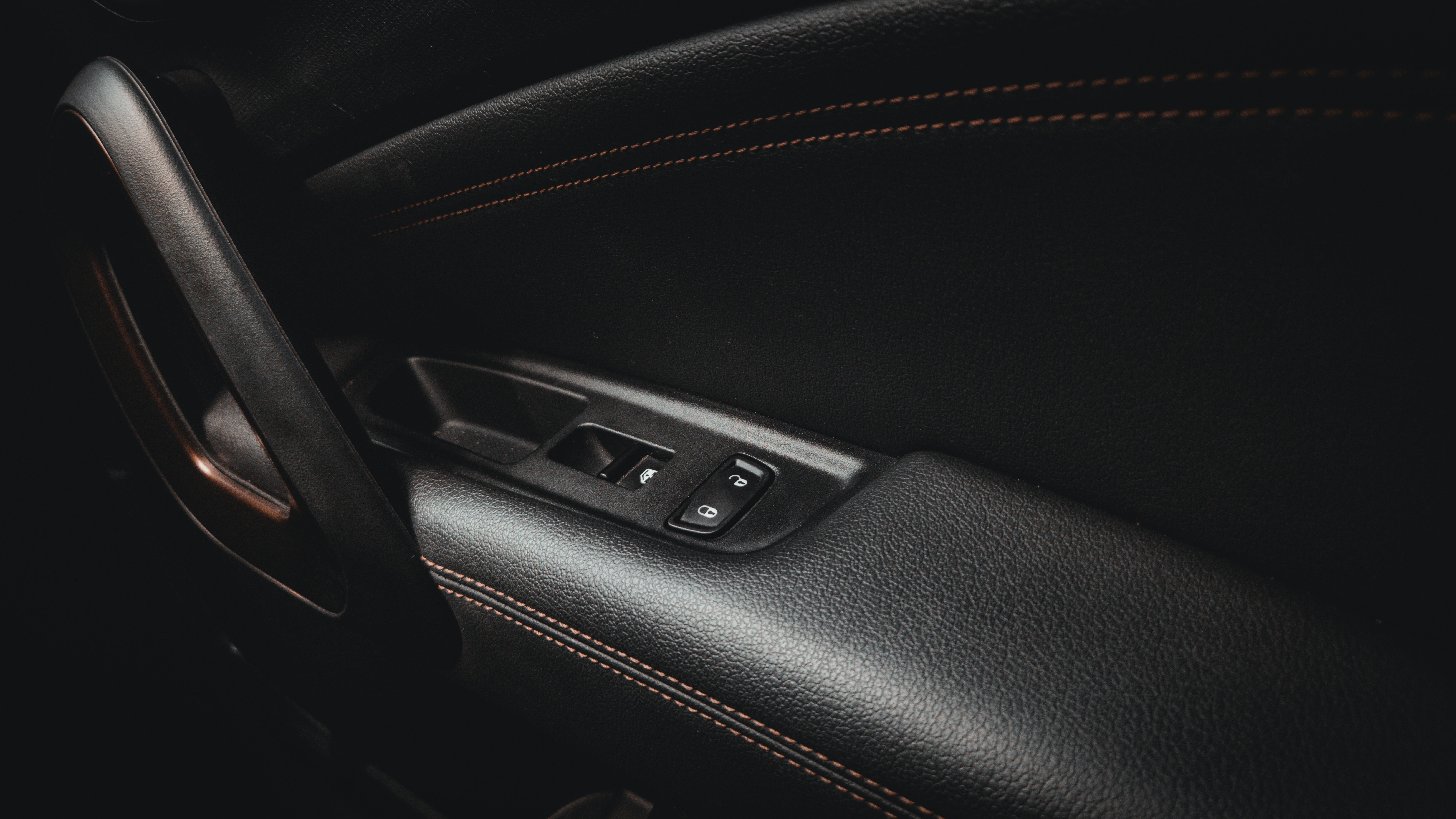 Stitched door panel and interior trim detail