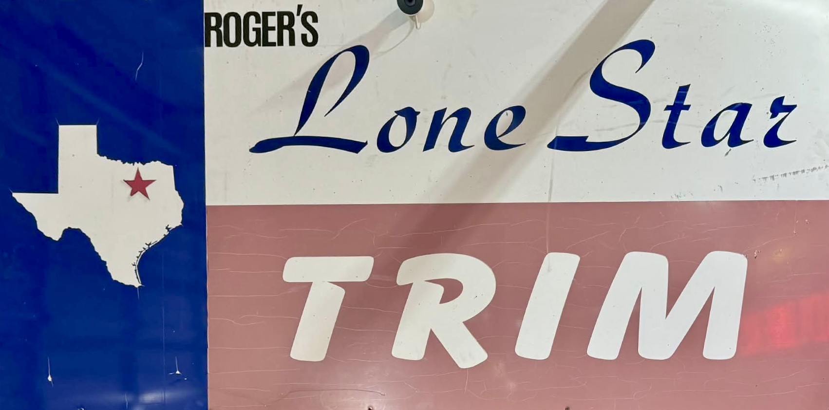 Roger's Lone Star Trim painted sign
