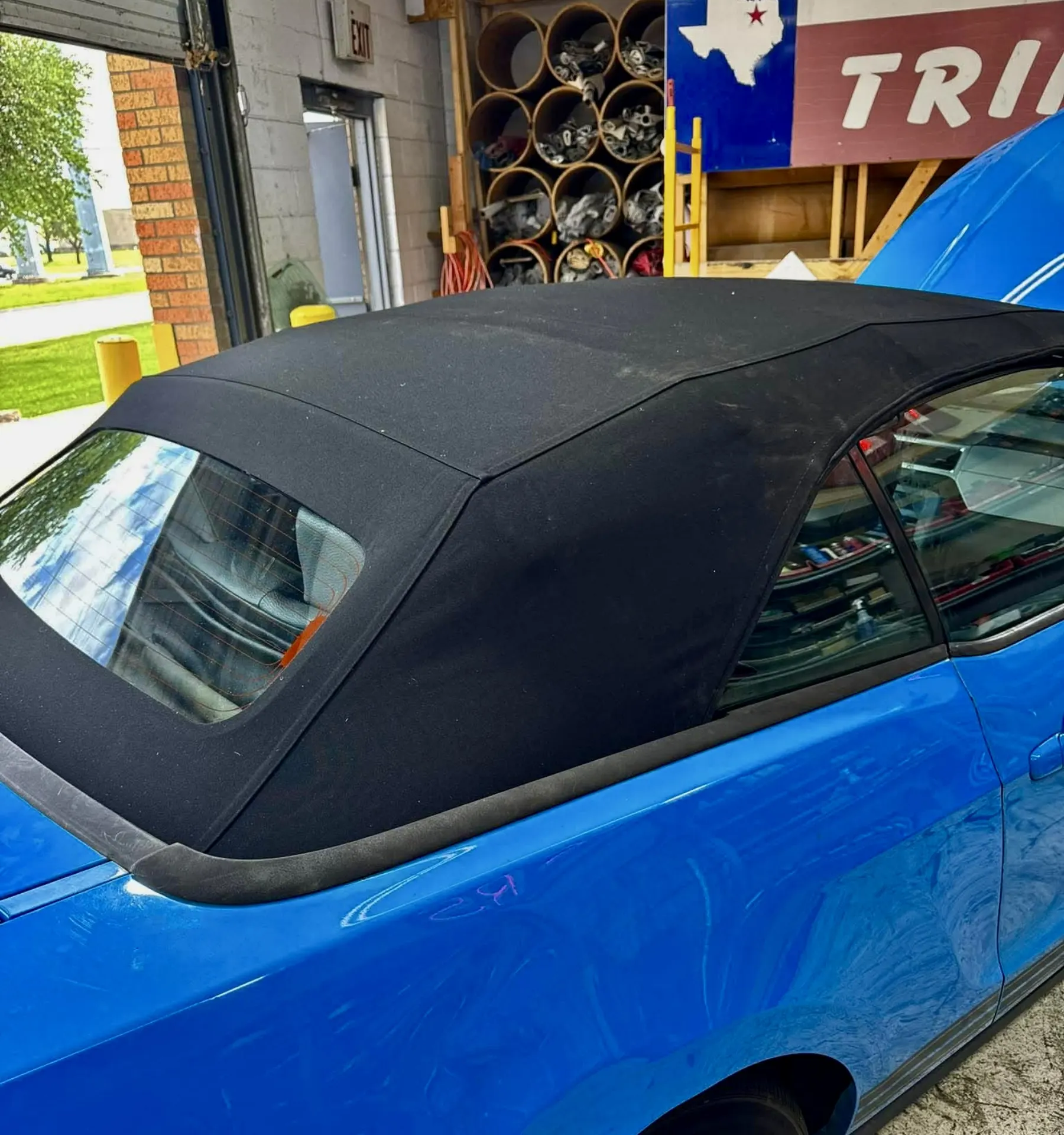 Blue convertible with custom soft top