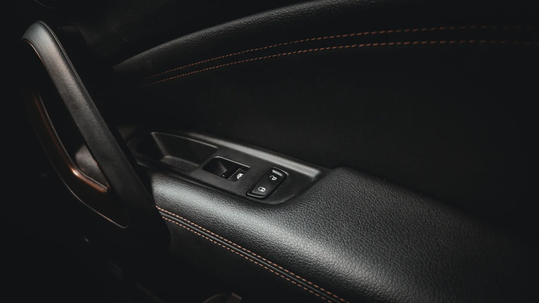 Stitched door panel and interior trim detail