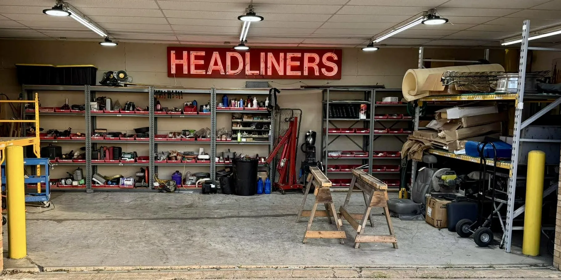 Roger's trim shop interior with Headliners sign on back wall